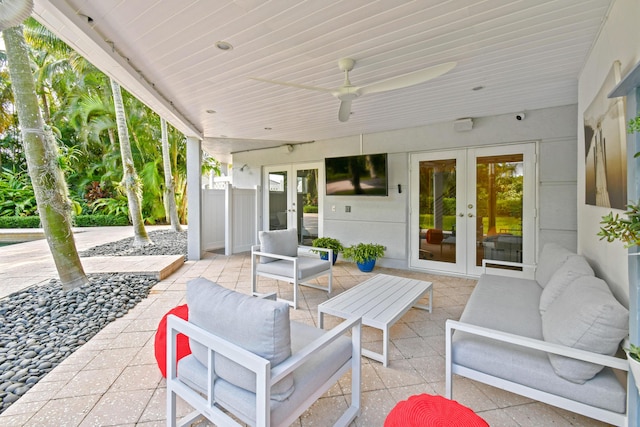 view of patio with ceiling fan, french doors, and an outdoor living space