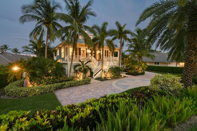 mediterranean / spanish-style house featuring covered porch