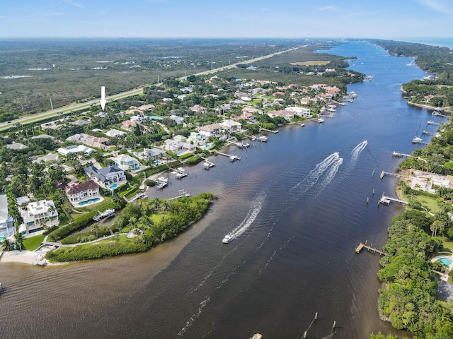 drone / aerial view featuring a water view