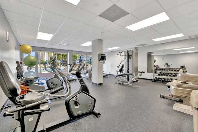 workout area with a drop ceiling