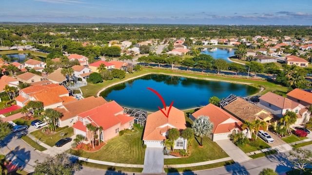 drone / aerial view featuring a water view