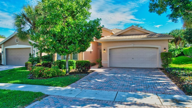 view of front of property with a garage