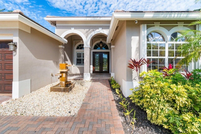 doorway to property featuring french doors