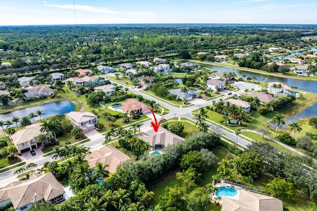 bird's eye view with a water view