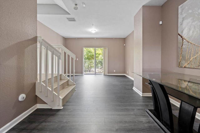 hall featuring dark wood-type flooring