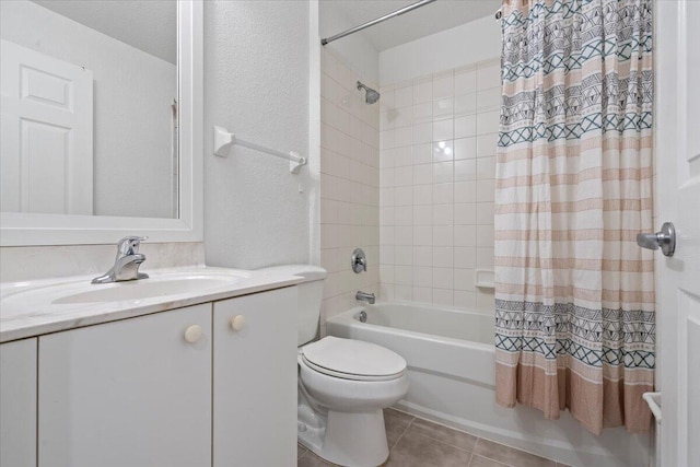 full bathroom featuring shower / bath combo, vanity, toilet, and tile patterned floors