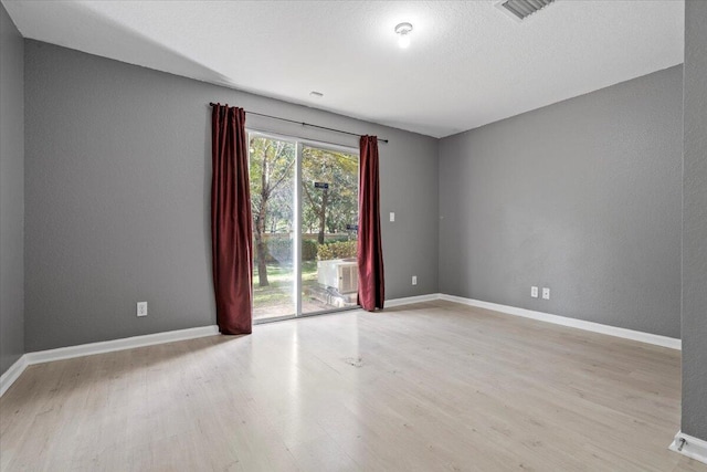 empty room featuring light wood-type flooring