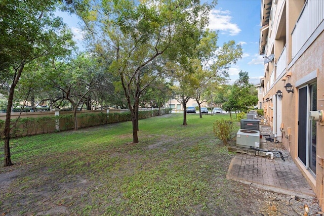 view of yard featuring central AC