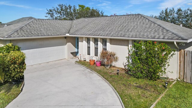 ranch-style home with a garage