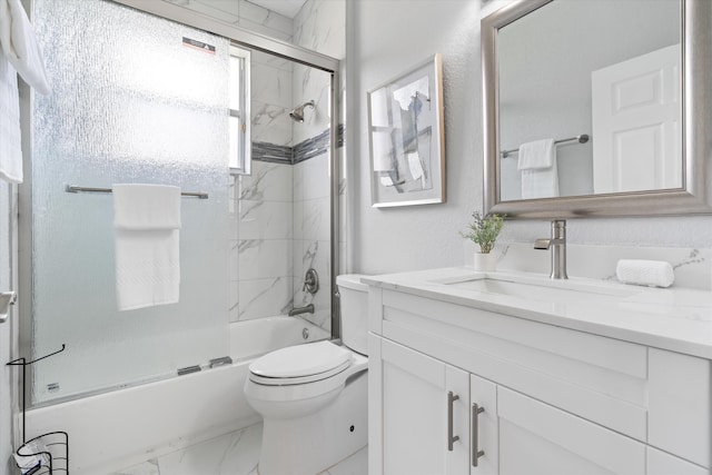 full bathroom featuring vanity, toilet, and enclosed tub / shower combo