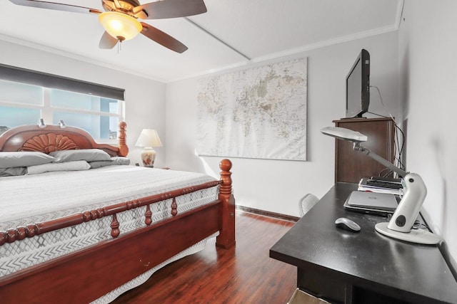 bedroom featuring ceiling fan, crown molding, and dark wood-type flooring