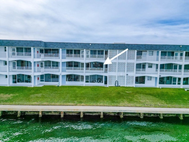 view of building exterior featuring a water view