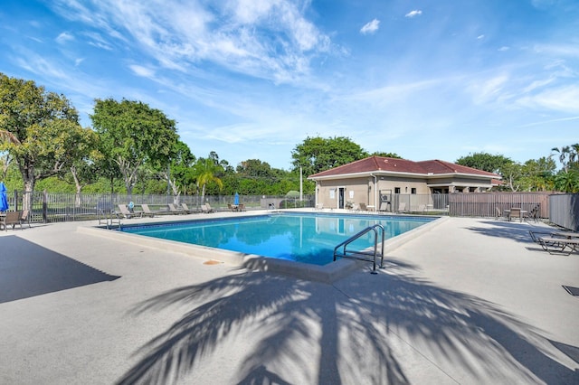 view of pool featuring a patio