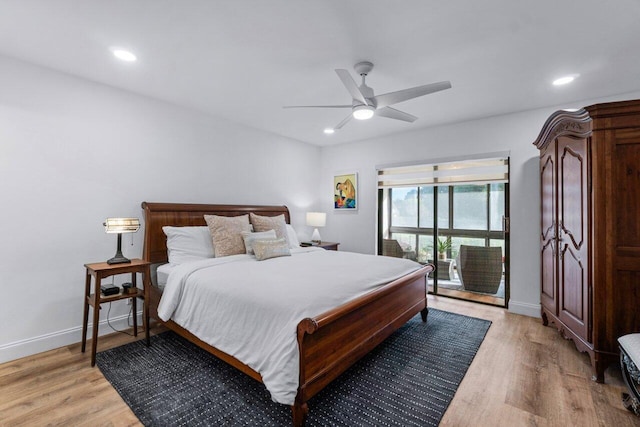 bedroom with ceiling fan and light wood-type flooring