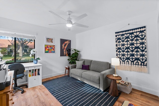 office area with hardwood / wood-style floors and ceiling fan