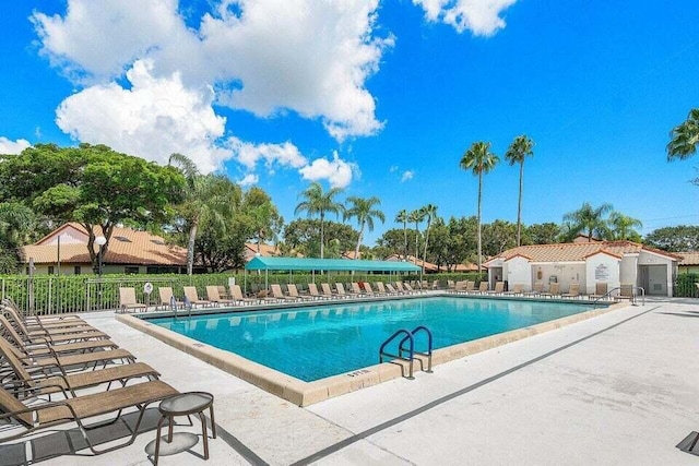 view of swimming pool with a patio