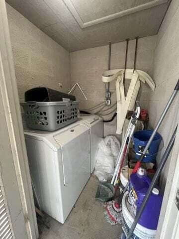 washroom featuring independent washer and dryer