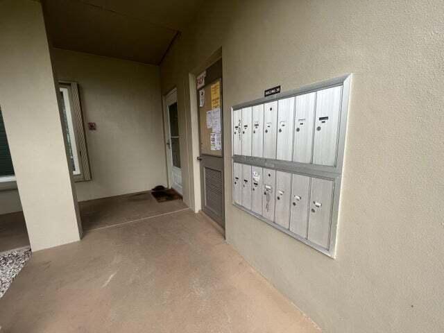 view of property's community with mail boxes