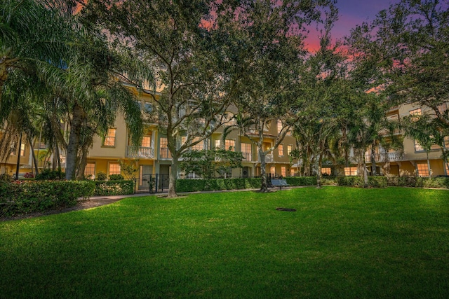 surrounding community featuring a lawn