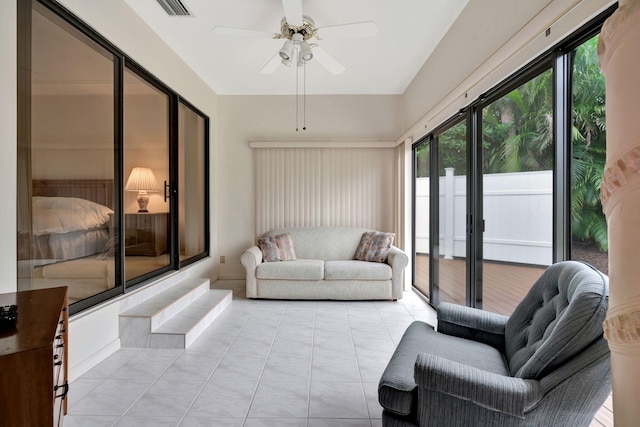 sunroom with ceiling fan