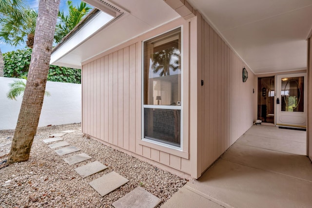 property entrance featuring a patio