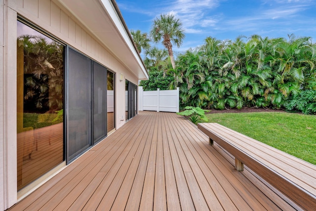 wooden deck with a yard