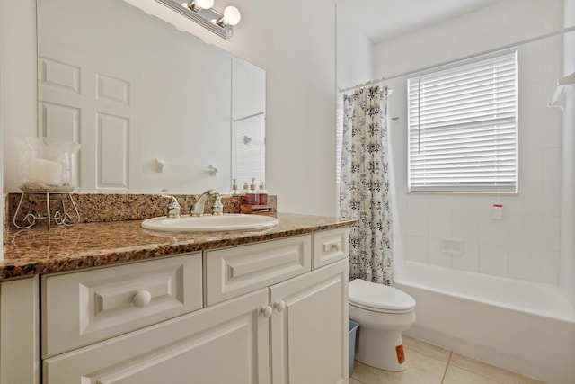 full bathroom featuring tile patterned flooring, vanity, shower / bath combination with curtain, and toilet