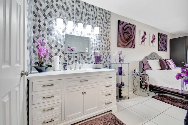 bathroom featuring tile patterned floors, tasteful backsplash, and vanity