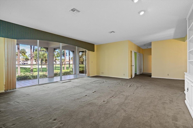 unfurnished living room with carpet floors