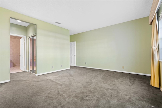 spare room with carpet floors