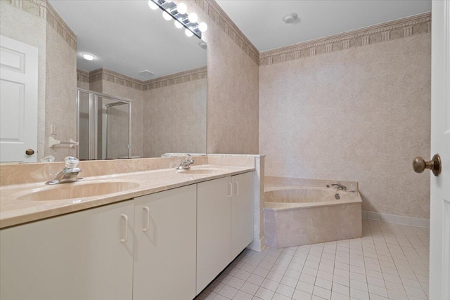 bathroom with tile patterned flooring, vanity, and independent shower and bath