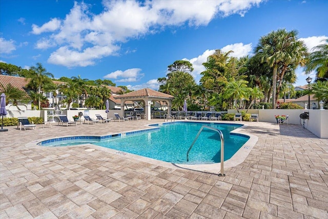 view of pool featuring a gazebo and a patio area