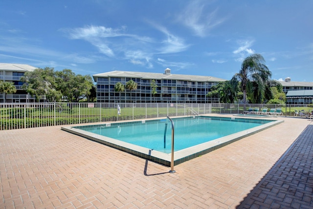 view of pool featuring a patio