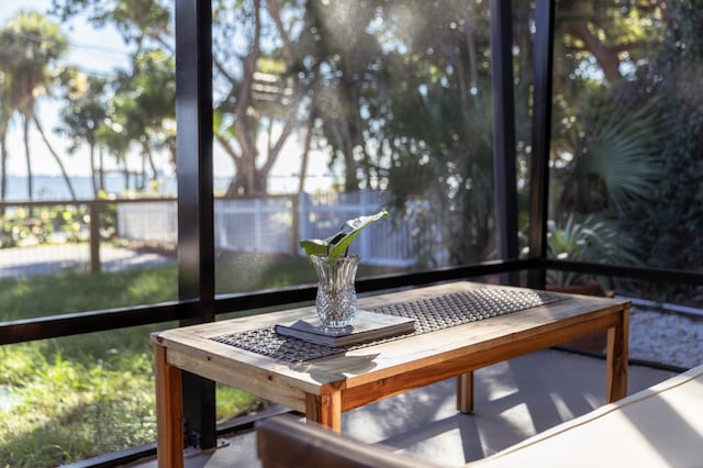 unfurnished sunroom featuring a healthy amount of sunlight