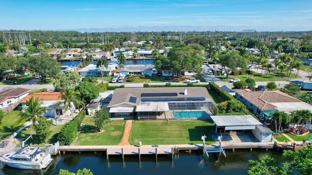 drone / aerial view with a water view