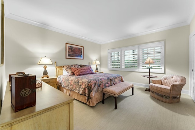 bedroom featuring light carpet and crown molding