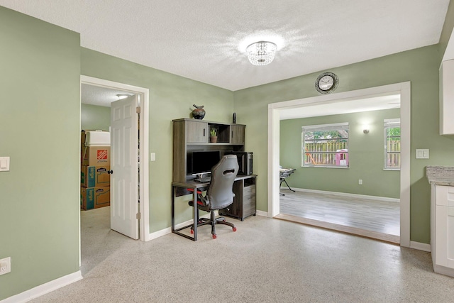 office with a textured ceiling