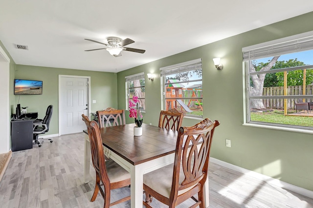 dining room featuring light hardwood / wood-style flooring and ceiling fan