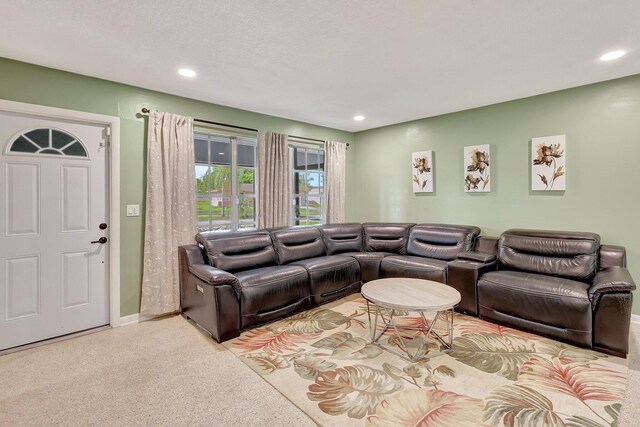 living room featuring a textured ceiling