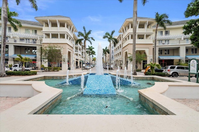 view of swimming pool featuring pool water feature