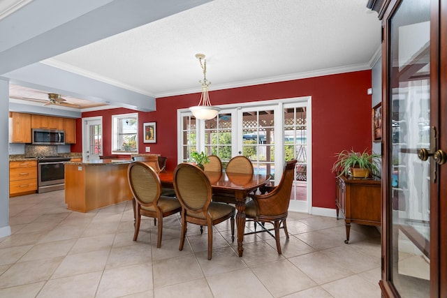 dining space featuring ornamental molding, french doors, and a textured ceiling