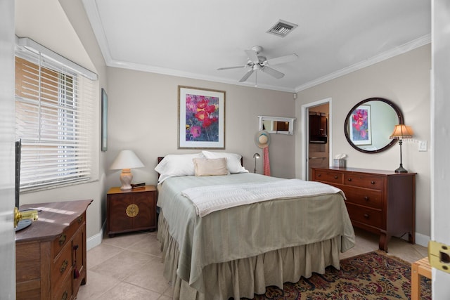 bedroom with light tile patterned floors, baseboards, visible vents, and ornamental molding