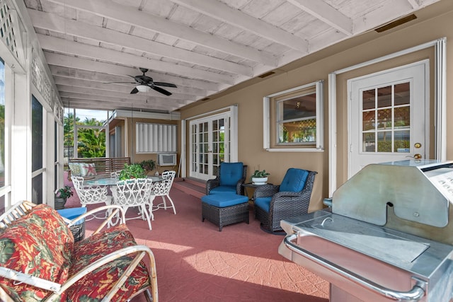 view of patio featuring outdoor dining space, visible vents, a ceiling fan, and french doors