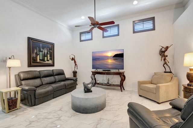 living room with crown molding and ceiling fan