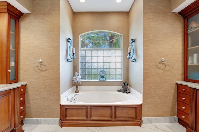 bathroom featuring a bathtub and vanity