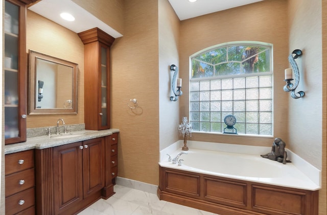 bathroom featuring a bathtub and vanity