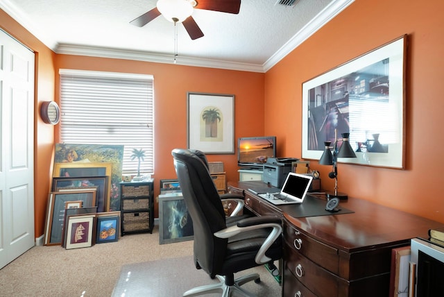 office with carpet flooring, ceiling fan, ornamental molding, and a textured ceiling