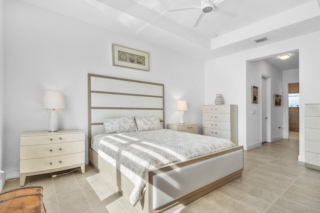 tiled bedroom with ceiling fan