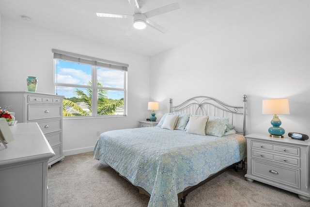 bedroom featuring ceiling fan and light colored carpet