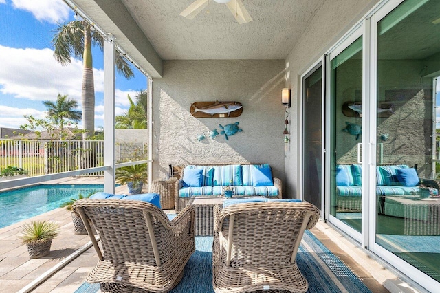 sunroom / solarium with ceiling fan